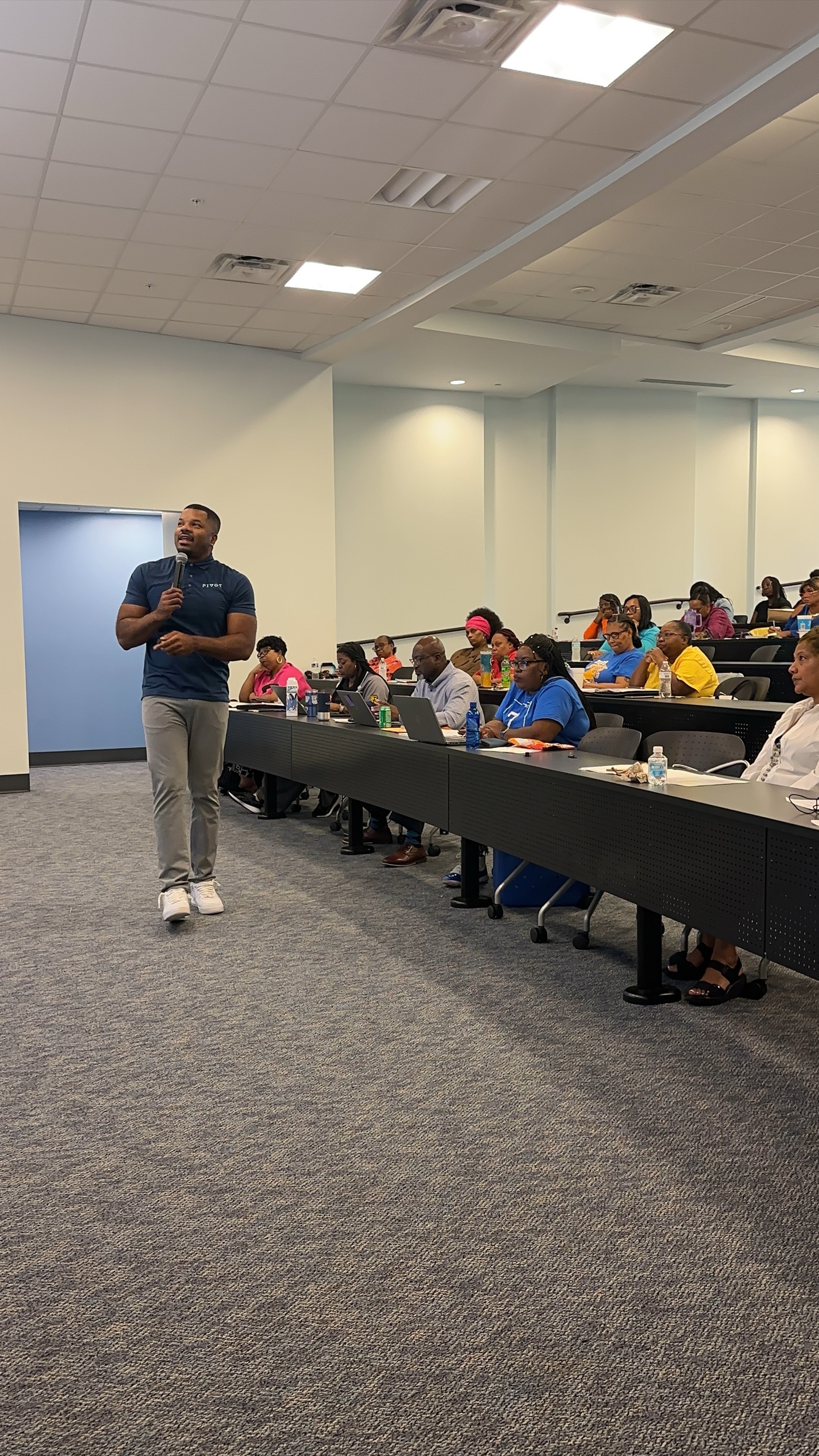 Keynote speaker Chris Marvel presenting mental health workshop to corporate audience
